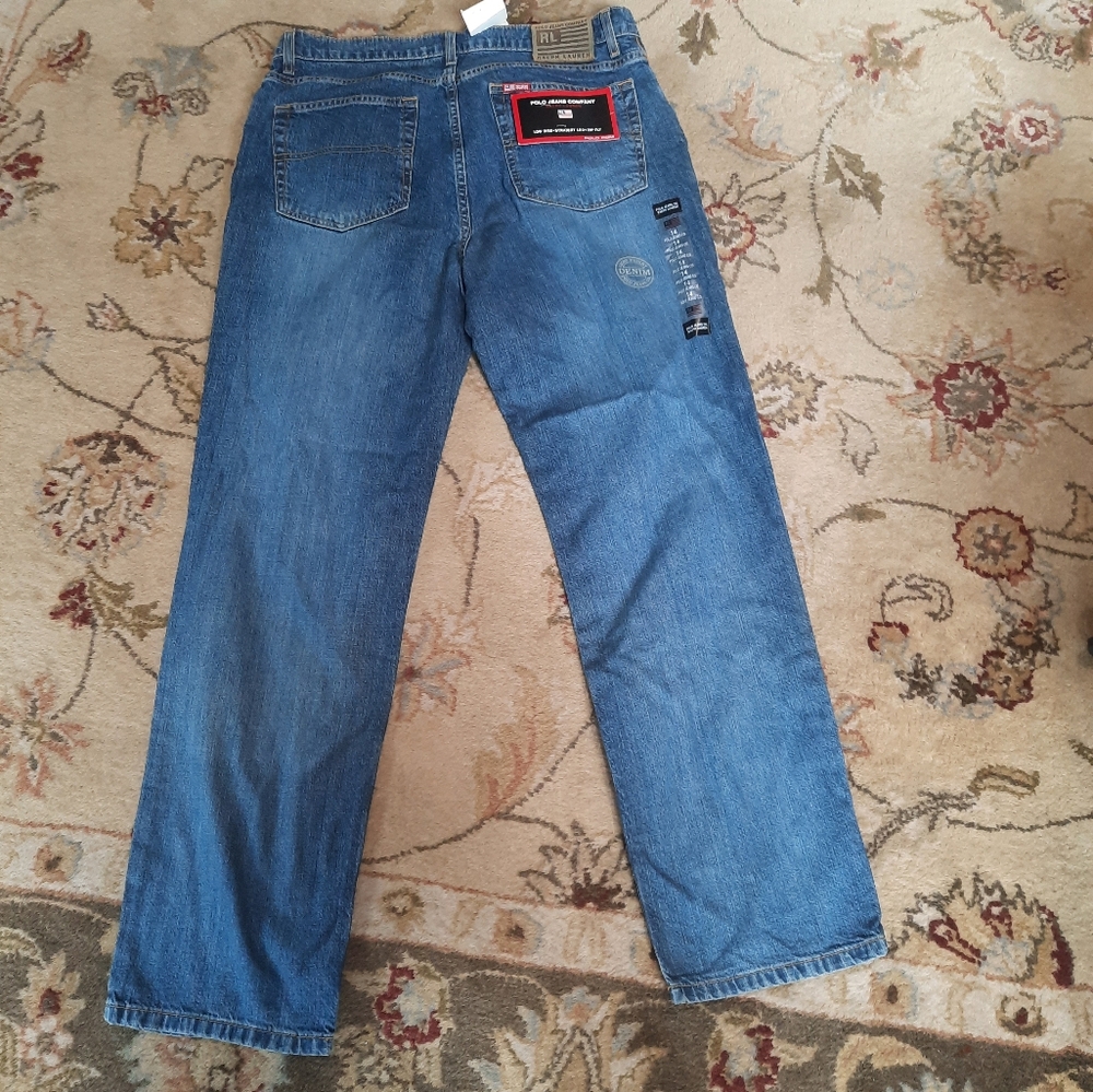 Woman's low rise, straight leg, zip fly Ralph Lauren jeans. Size 14